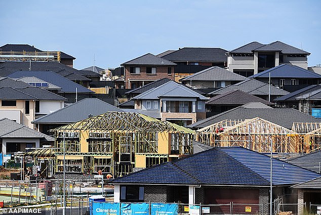 Dr Oliver calculated that Australia could be up to 285,000 homes short by mid-2024, as surging immigration outpaced the completion of new houses and apartments (pictured is construction at Oran Park in Sydney's outer south-west)