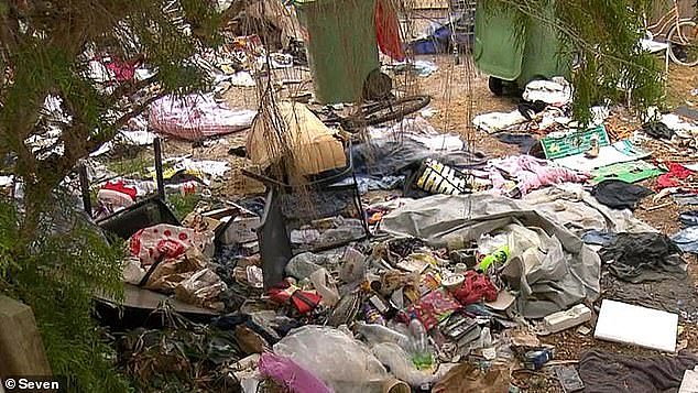 Piles of rubbish including general waste and clothes have been discarded all over the front yard of the home, with residents from nearby properties deeming the home a major health hazard