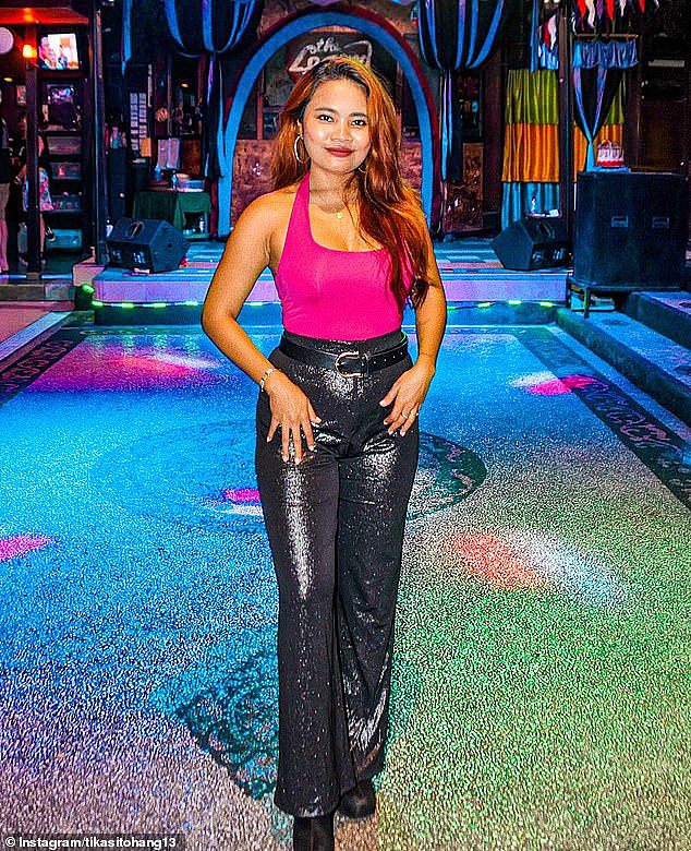 Bali singer Sartika Sitohang (pictured) allegedly had money stolen form her purse by a group of tourists while performing at a packed bar on Saturday night