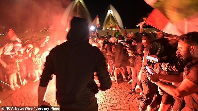 During the wild scenes at the Sydney Opera House protesters chanted 'gas the Jews' and 'f*** the Jews'