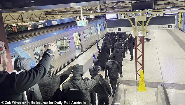 At the station, the group performed the Nazi salute which was recently banned in Victoria