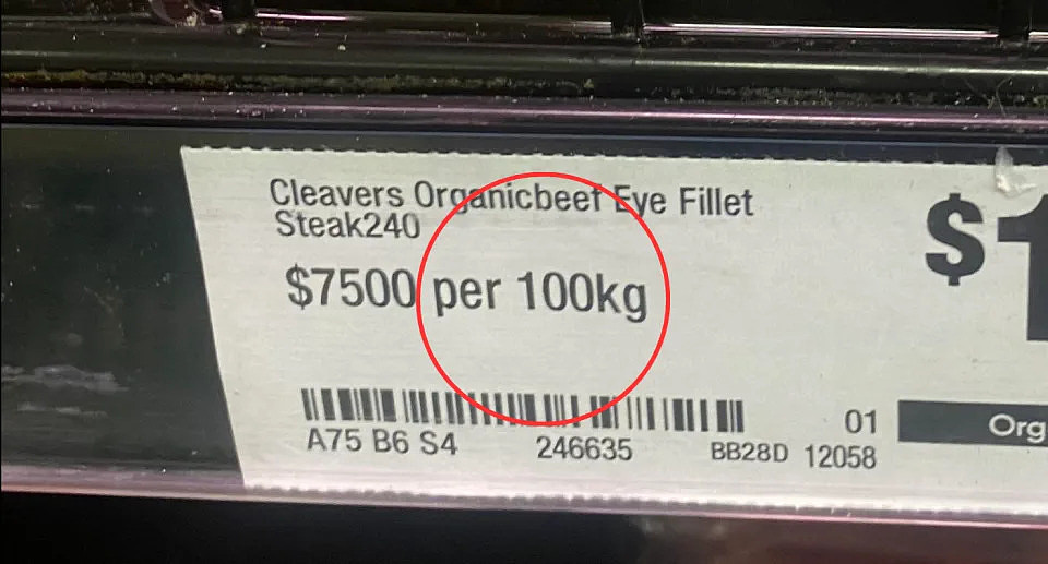 Close up of label with pricing at $7500 per 100kg.