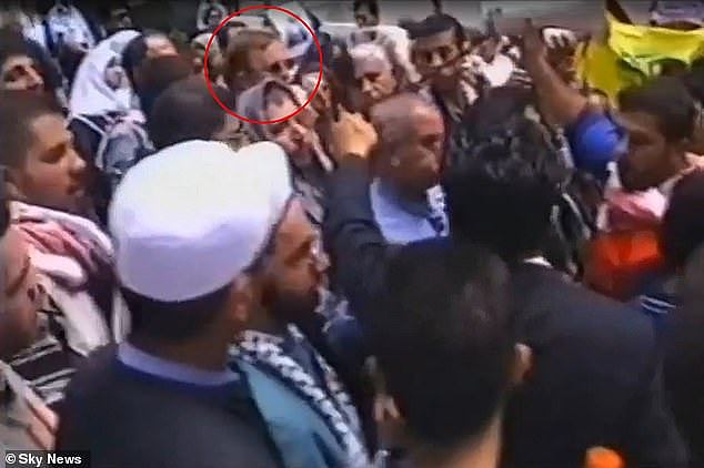 A younger Anthony Albanese (circled) early on in his political career was spotted at a Sydney protest condemning the actions of the Israeli military