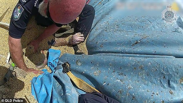 Breathtaking footage captured the moment rescue teams and police officers attempted to free John Lawson, 78, from Baralaba in Queensland after he fell into a grain silo on February 23 this year