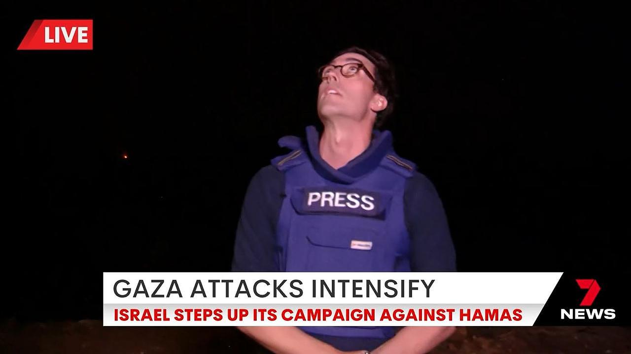 Channel 7 reporter David Woiwod spots a rocket firing overhead.