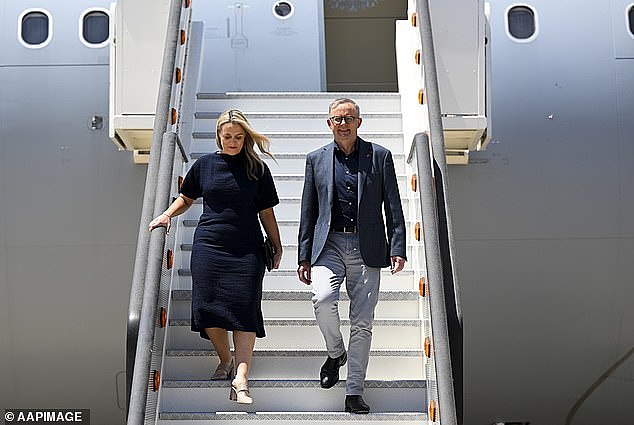 The attacks on Anthony Albanese over the amount of time he spends overseas continue to mount, with a talkback radio host being the latest to point it out. Mr Albanese and his partner Jodie Haydon are pictured getting off a plane in Madrid, Spain on June 27, 2022
