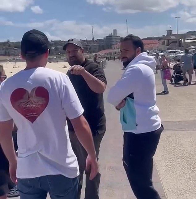 Australians have clashed over the Israel-Palestine conflict at Sydney's Bondi Beach after two men attempted to destroy posters of Israelis who were taken hostage by Hamas terrorists