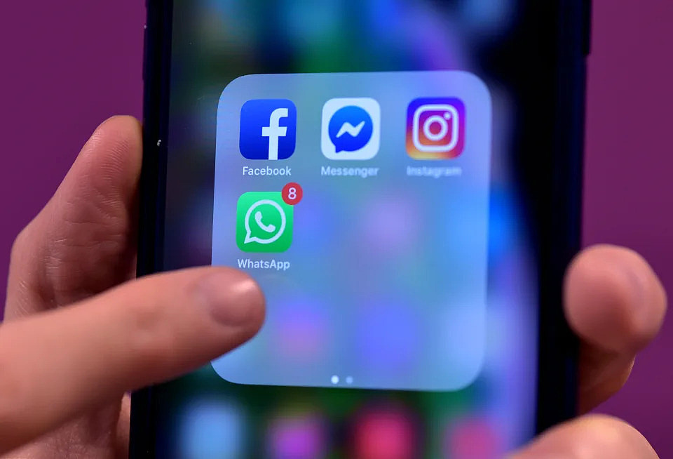 Stock photo of Facebook, Messenger, Instagram and WhatsApp, social media app icons on a smart phone. 