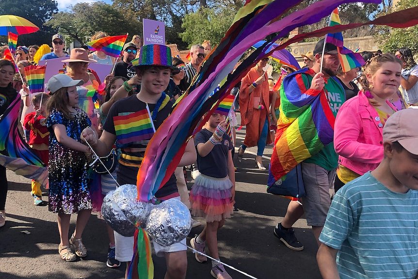 Rainbows everywhere amongst dozens of children