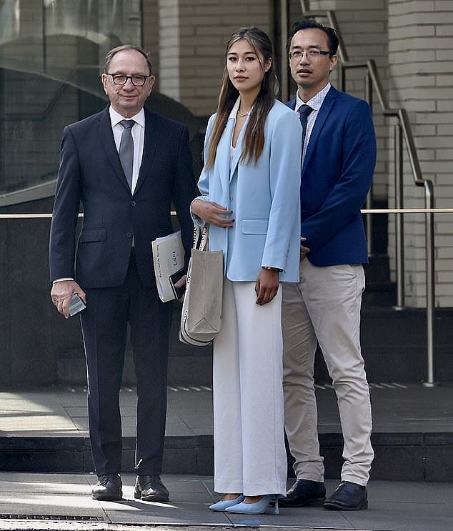 Paris Ow-Yang arrives at court with her neurosurgeon father, Dr Michael Ow-Yang (right) and lawyer Michael Bowe (left)