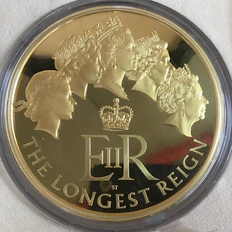 The incredibly rare coin was released to commemorate Queen Elizabeth II becoming the UK's longest serving monarch.