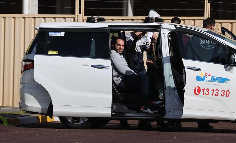 Former Yongah Hills detainees were being taken to Perth Airport, bound for the Eastern States.