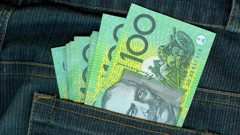 Pocket full of Australian hundred dollar banknotes