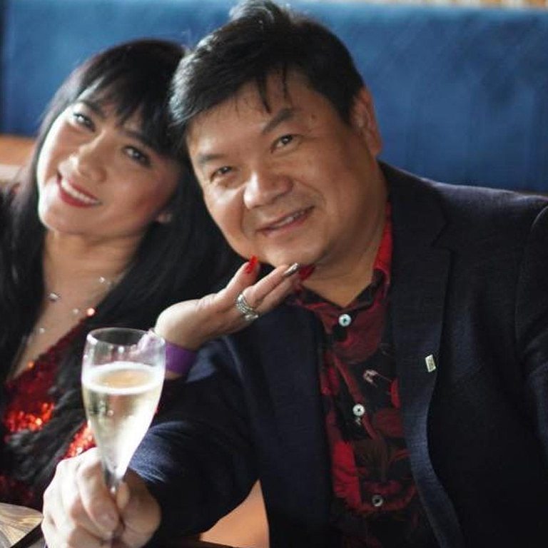 Cabramatta East Day and Night pharmacy owner Ben Huynh (R) and Le Hoa Thuy Thach, who runs Supercars Australia. Ms Le Thach is not accused of any wrongdoing. Picture: Instagram