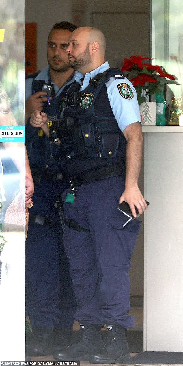 Home Affairs prepared a list of serious offenders held in immigration detention ahead of the High Court decision that saw at least 111 detainees freed. Police are pictured at a motel where asylum seekers have been released to