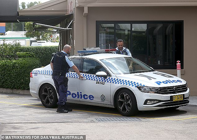 The federal government passed emergency legislation last Thursday to increase surveillance and restrictions on the detainees who have been released. Police are pictured at a Sydney motel where former detainees are staying