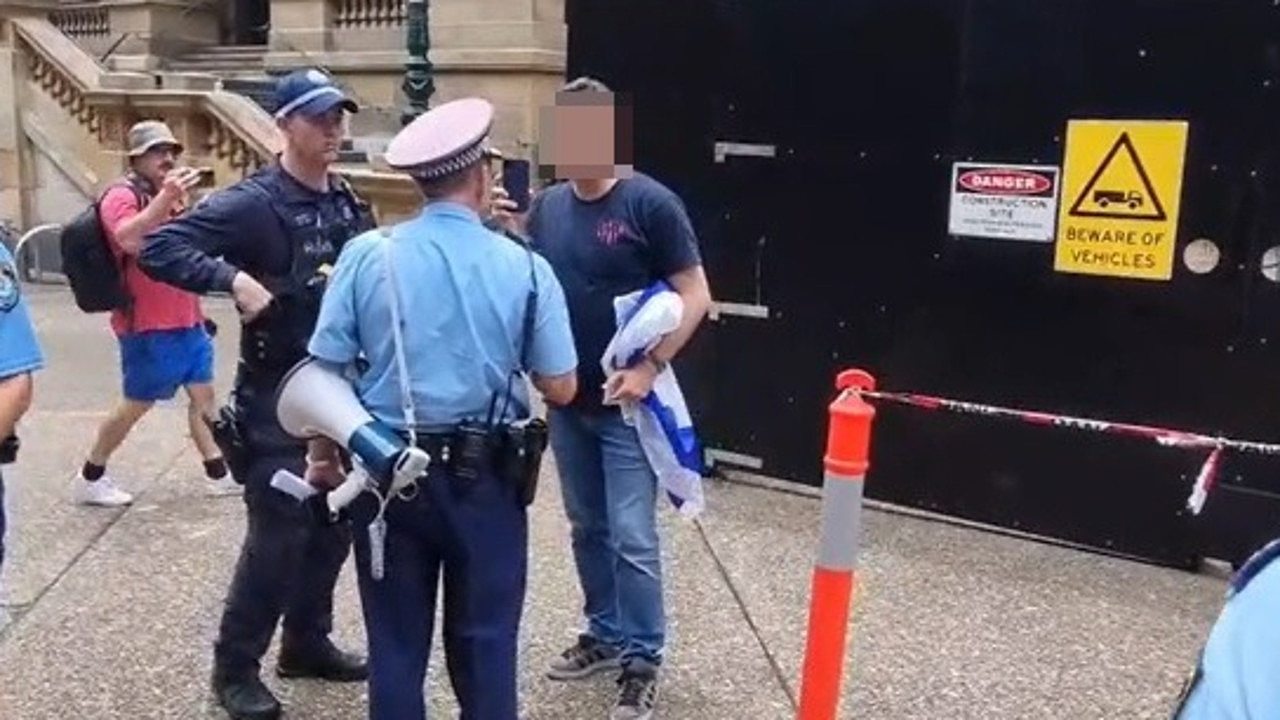 He could be seen speaking with officers and trying to film them. Picture: Arkangel_Sydney / TikTok