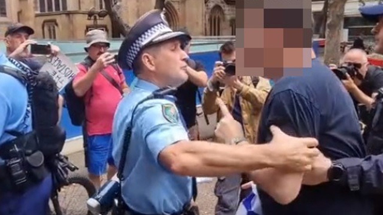 The situation escalated when the man was lead away from the main protest group. Picture: Arkangel_Sydney / TikTok