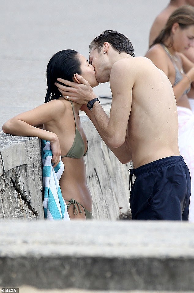 It seems Yan Yan has a type, as she was spotted kissing a remarkably similar looking mystery man at Bronte Beach, Sydney, on Thursday