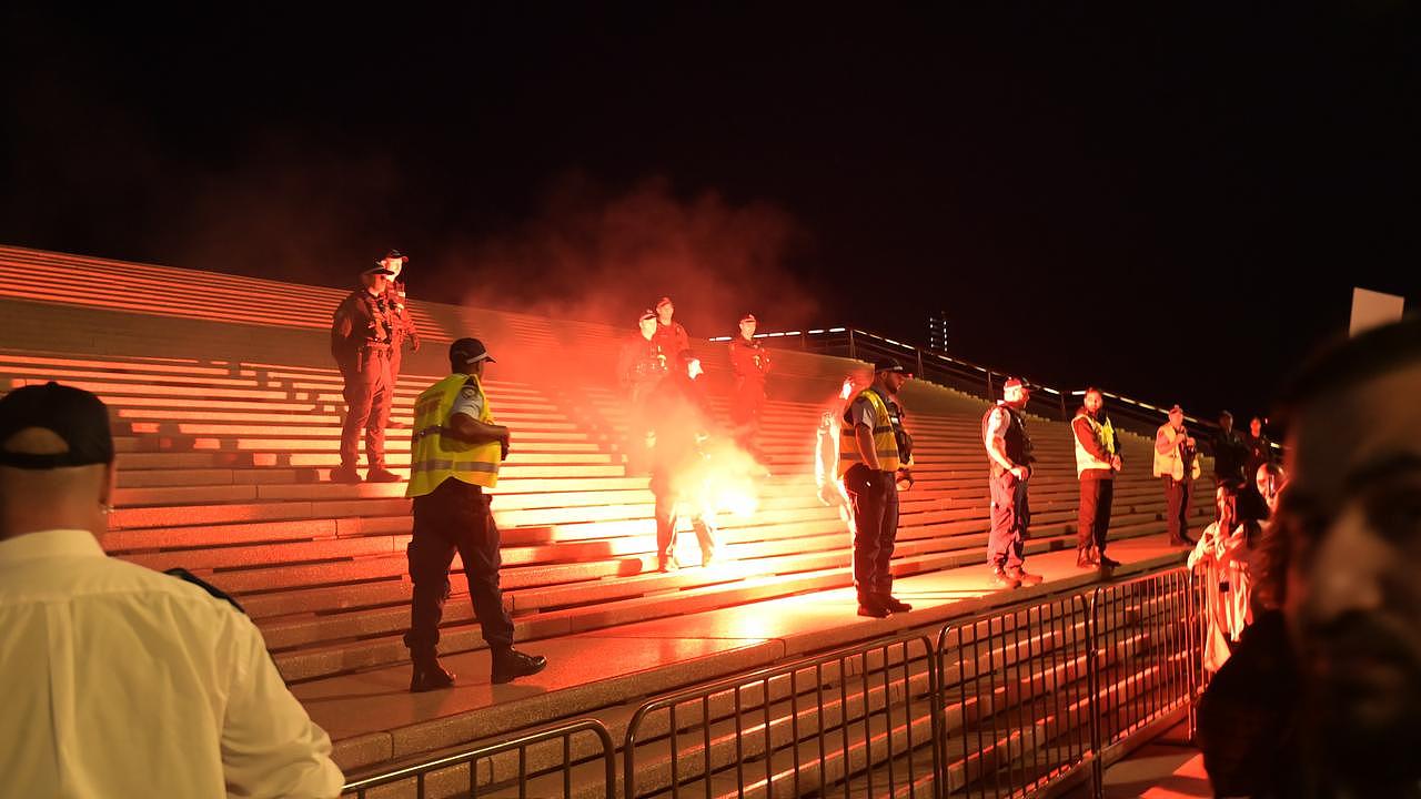Flares were thrown on the forecourt of The Sydney Opera House in Sydney at a Pro-Palestine rally. Picture: NCA NewsWire / Jeremy Piper