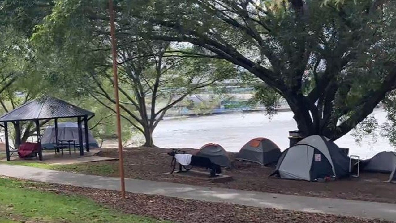 The video showed several groups of tents in a park along Brisbane River. Picture: Reddit