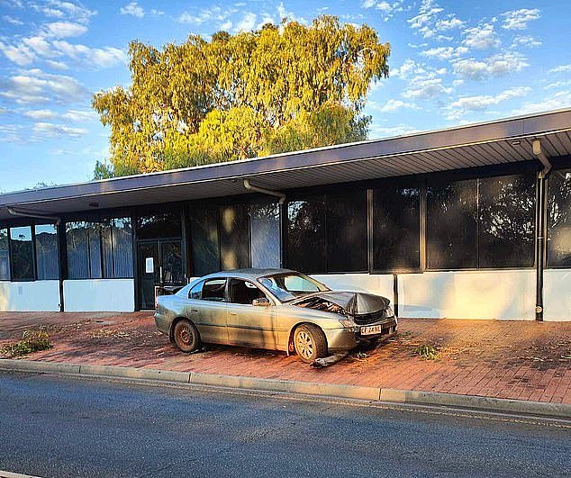 Locals say little has changed in Alice Springs since Anthony Albanese visited in January and promised they would see action 'as soon as possible' (pictured, a crashed car left in the CBD earlier this month)