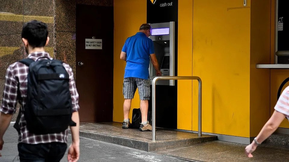 Customer uses an ATM