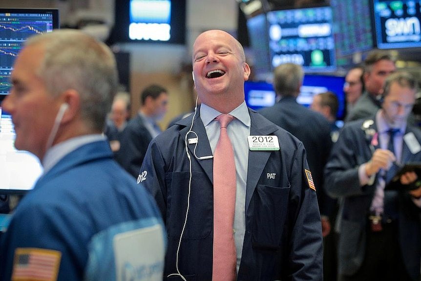 Wall St trader laughing