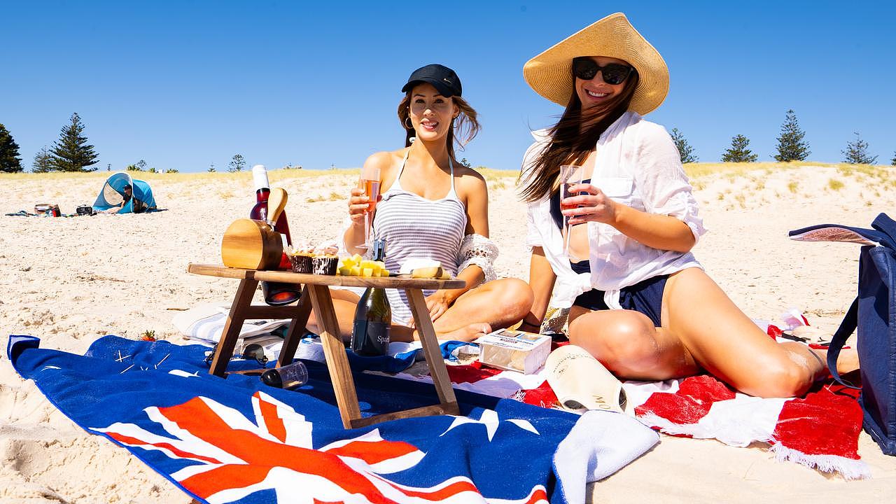 Lauren Ruiz and US tourist Rhianna Lyndop enjoy Australia Day 2023 at Grange Beach. Picture: Morgan Sette