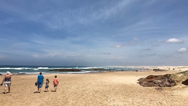 A large group of tourists were rescued at Birubi Beach in New South Wales on December 29, after finding themselves fighting for their life in a rip.
Picture: Geoff Clark