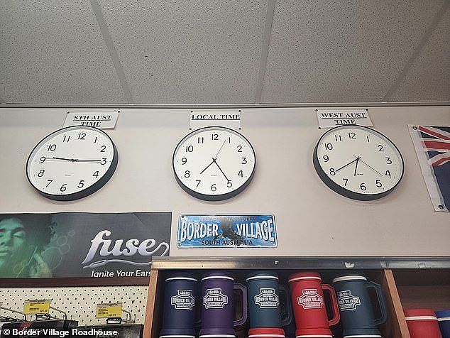 Three clocks (pictured) in the Border Village Roadhouse show the time in South Australia and Western Australia, as well as the local time
