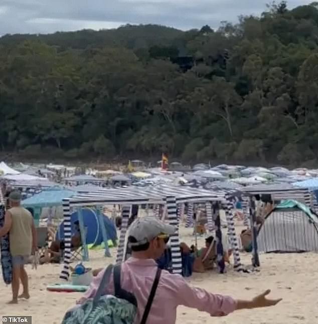 A video taken at Noosa Heads Main Beach on Thursday showed hundreds of CoolCabanas, the beach tents with open sides, taking up most of the sand
