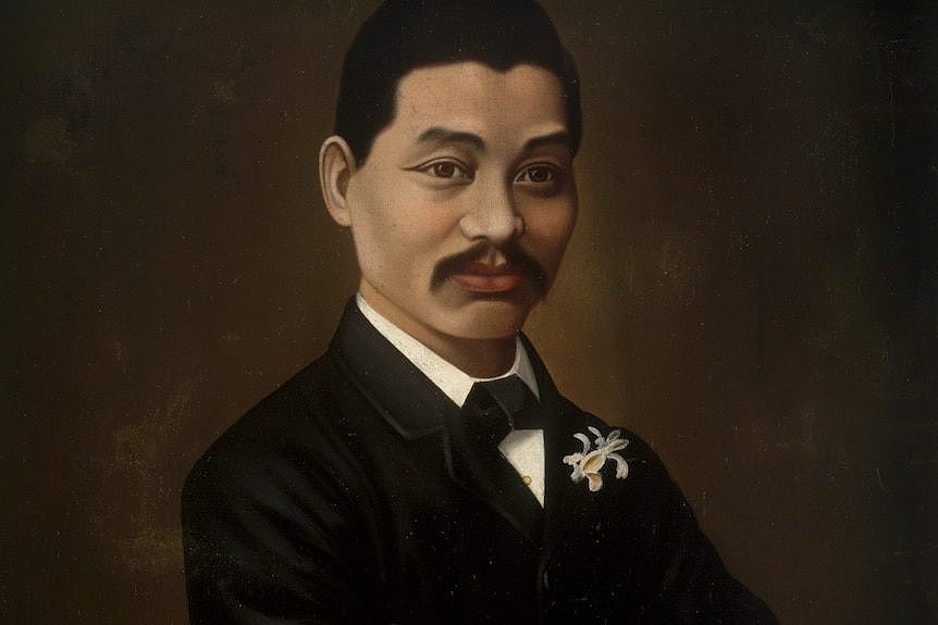 A painting of a Chinese-Australian man in a suit 