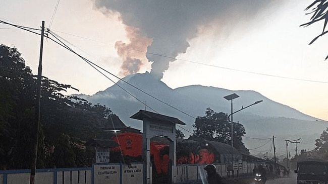 Clouds of ash were seen in the sky above the mountain on Wednesday. Picture: Twitter