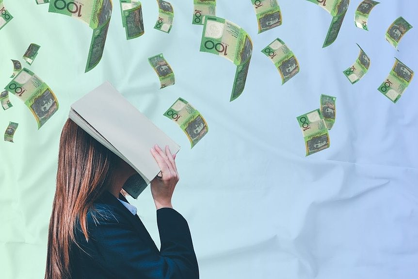 A generic graphic image of a woman covering her face as money rains down. 