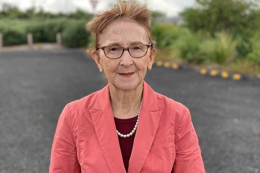 a woman wearing glasses