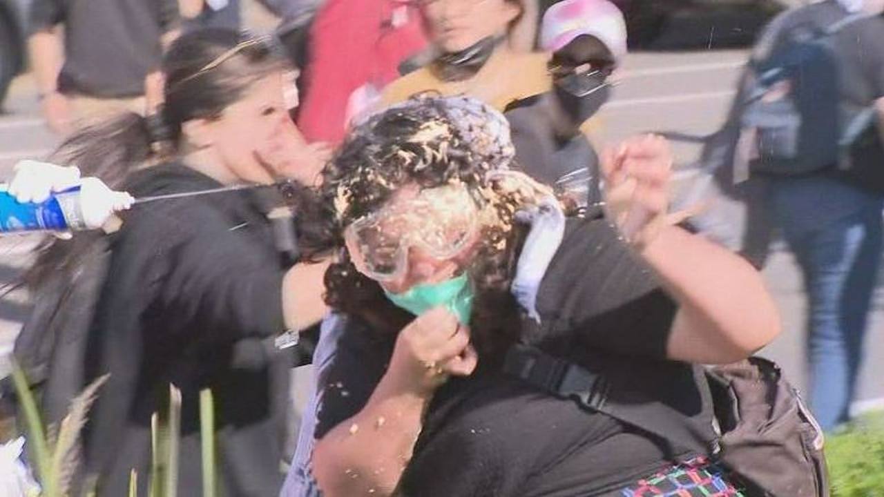 A protesters face being sprayed with an unidentified liquid. Picture: Nine