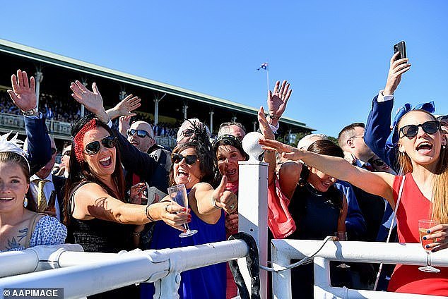 Australians have to wait until their late thirties to be above average with the 35 to 39 age group having an average personal income of $76,200 (pictured are spectators at Sydney's Royal Randwick Racecourse)