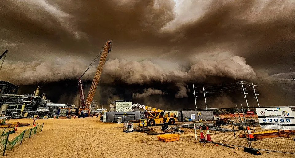 The intense dust storm barrelling across a Santos gas field in SA's Far North.