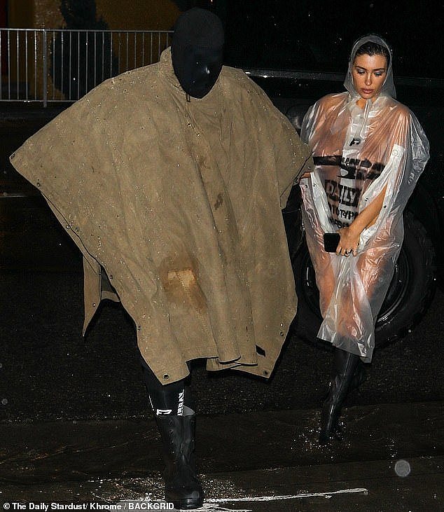 Bianca Censori struggled to protect her modesty as she arrived at an LA studio with Kanye West on Monday