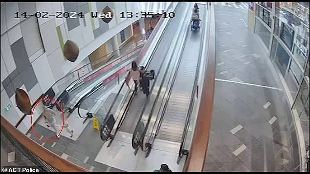 The alleged thief was seen running up an escalator with his alleged victim in pursuit