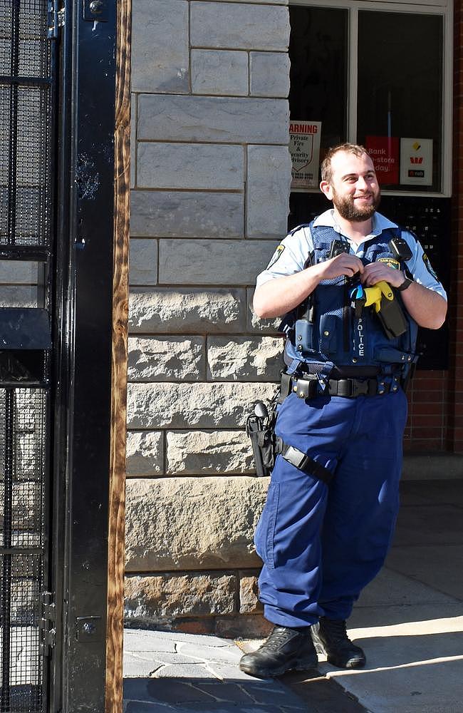 Then-Senior Constable Troy Cridland at work.