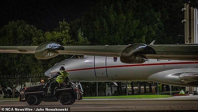 Taylor's flight (VJT993) from Honolulu, Hawaii, to Melbourne became the globe's most-tracked flight with almost 1,500 of her eager fans watching its trek across the Pacific. Pictured: Taylor's plane taxis after touching down on Friday