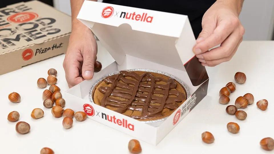 A decadent chocolate dessert is hitting the menus at a popular fast food chain. In a partnership between globally loved brands Pizza Hut and Nutella, a lush new menu item marrying the two companies together will be available from February 22: the loaded cookie with Nutella. Picture: Supplied