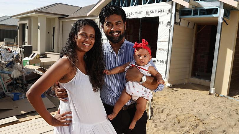 The sales of house and land packages are up with more West Australians choosing to sign up. Pictured are buyers Venuri and Shehan Panabokke with their 8 month old baby Amaara at their home site in Harrisdale