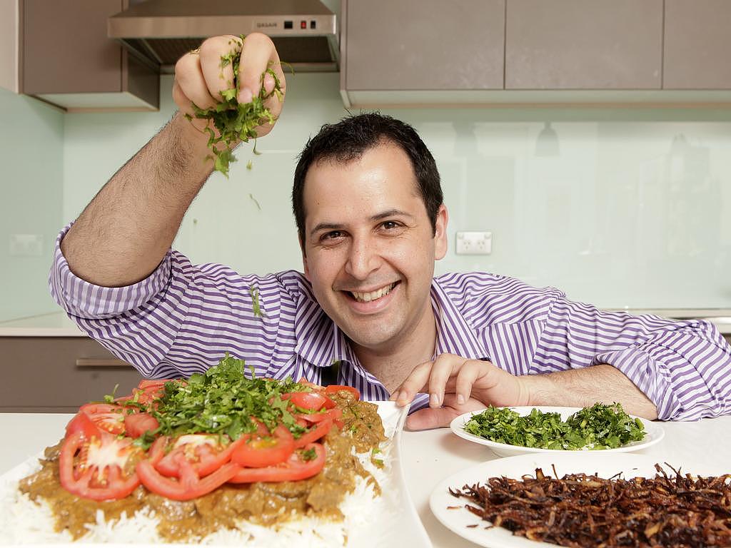 Former MasterChef Australia contestant Jimmy Seervai cooking up a parsi biryani dish in the kitchen of his Erskineville home in Sydney.