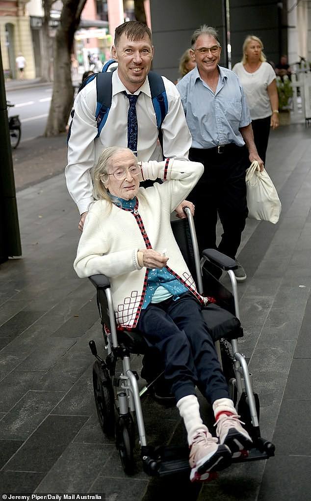 A 48-year-old man who says he is in a relationship with his grandfather's 104-year-old widow concedes they have never had sex and don't even share a bedroom. Mart Soeson is pictured pushing his girlfriend Elfriede Riit in a wheelchair to the Administrative Appeals Tribunal