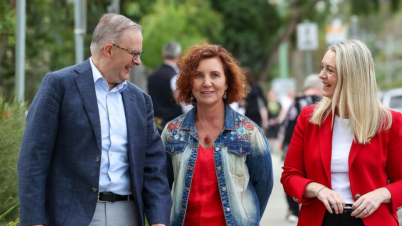 Prime Minister Anthony Albanese and his fiancee Jodie Haydon campaigned with Labor candidate Jodie Belyea at Derinya Primary School in Frankston South. Picture: NCA NewsWire / Ian Currie