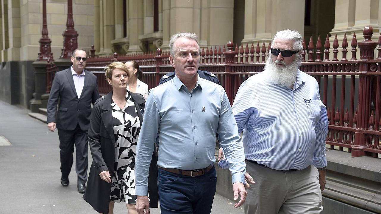 Family of the police killed in the Eastern Freeway crash arrive at the Supreme Court. Picture: NCA NewsWire / Andrew Henshaw
