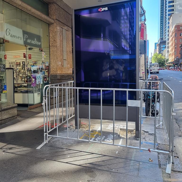 Work has begun on removing or relocating 20 digital billboards in Sydney CBD. Picture: Elise Kaine